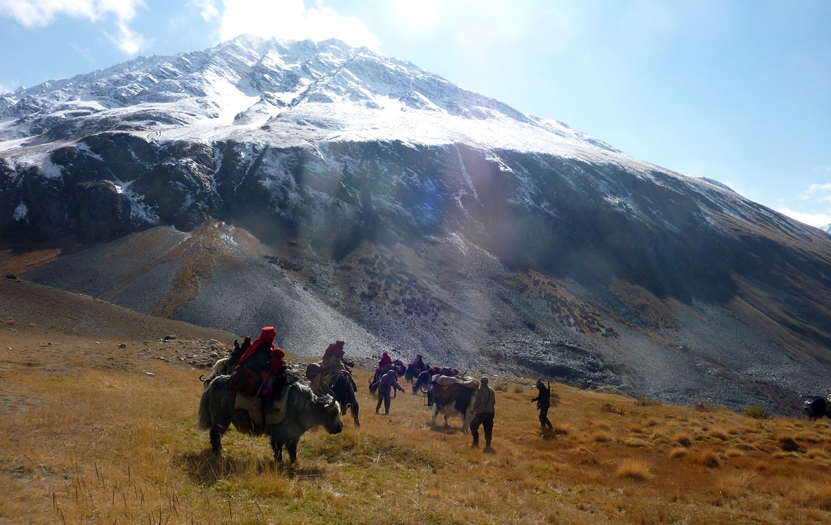 This picture taken on October 7, 2017 shows Kyrgyz nomad families travelling on yaks in the Wakhan Corridor in Afghanistan.