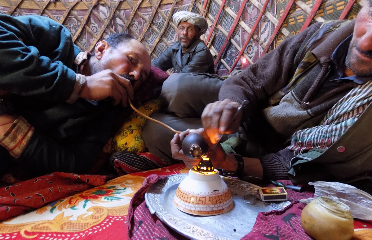 Relaxing with opium at the end of a day.