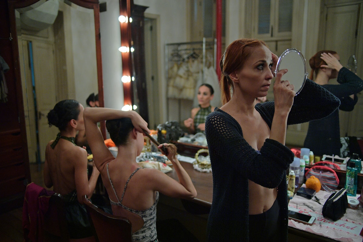 Ballet dancers get ready backstage as they rehearse before the opening night of a Ballet production at the Municipal Theater in Rio de Janeiro, Brazil on June 21, 2018. - I
