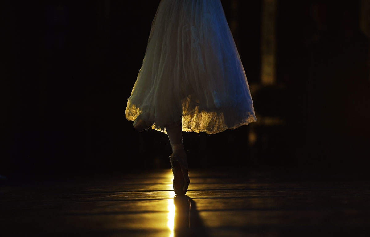 A Ballet dancer rehearses before the opening night of a Ballet production, at the Municipal Theater in Rio de Janeiro, Brazil on June 19, 2018.