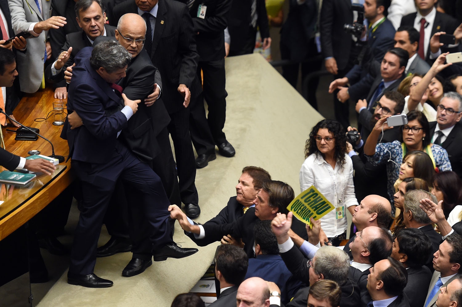 Brazilian Deputies fight during a session to discuss the admissibility of the impeachment request of President Dilma Rousseff in Brasilia on April 17, 2016. Brazilian Deputies fight during a session to discuss the admissibility of the impeachment request of President Dilma Rousseff in Brasilia on April 17, 2016.