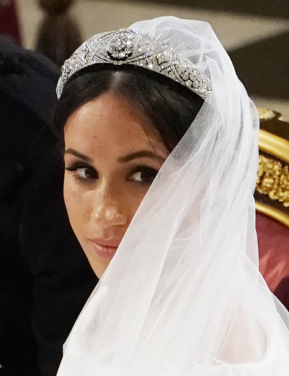US actress Meghan Markle stands st the altar with her future husband Britain's Prince Harry, Duke of Sussex (unseen) at the altar in St George's Chapel, Windsor Castle, in Windsor, on May 19, 2018 during their wedding ceremony. / AFP PHOTO / POOL / Owen H