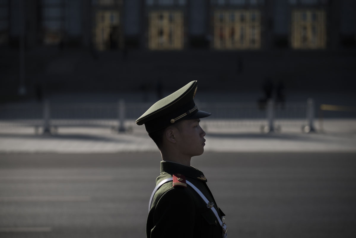 A paramilitary guard stands during the Chinese People's Political Consultative Conference plenary session at the Great Hall of the People in Beijing on March 9, 2017.