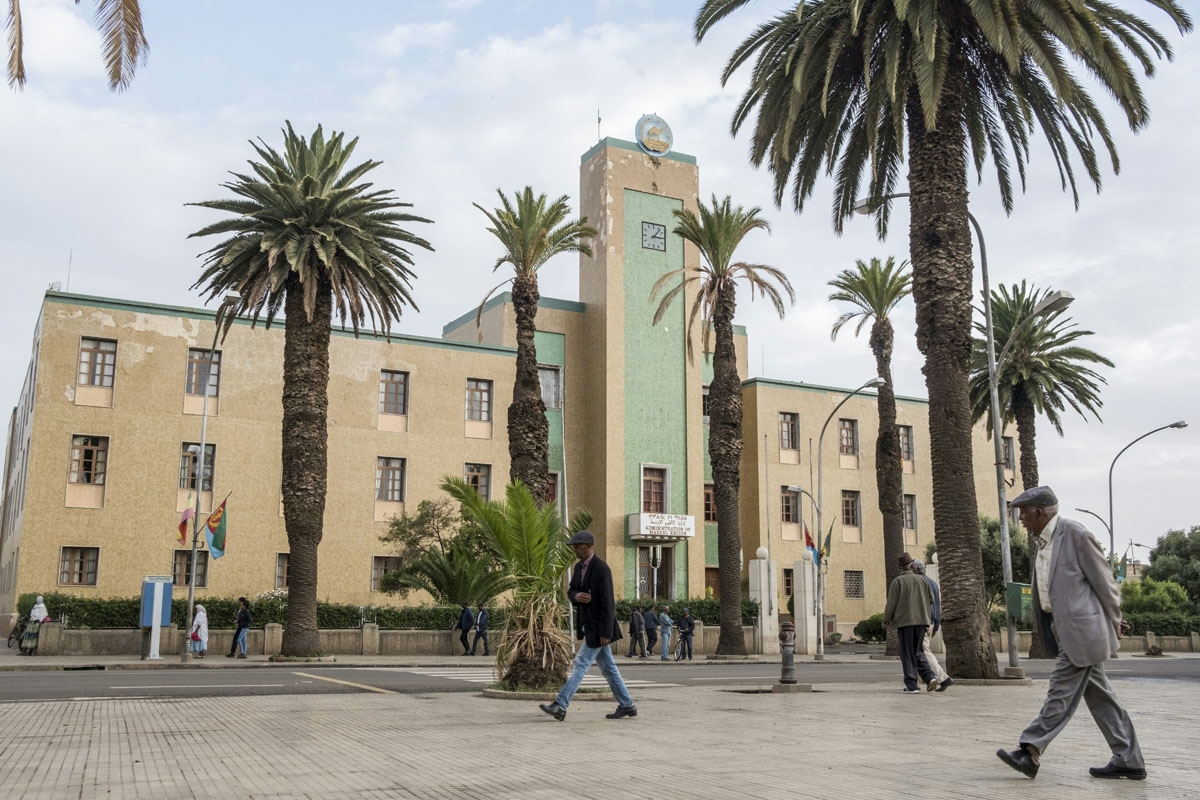 This photo taken on July 21, 2018, shows a man walking past a government administration building in the Eritrean capital Asmara.