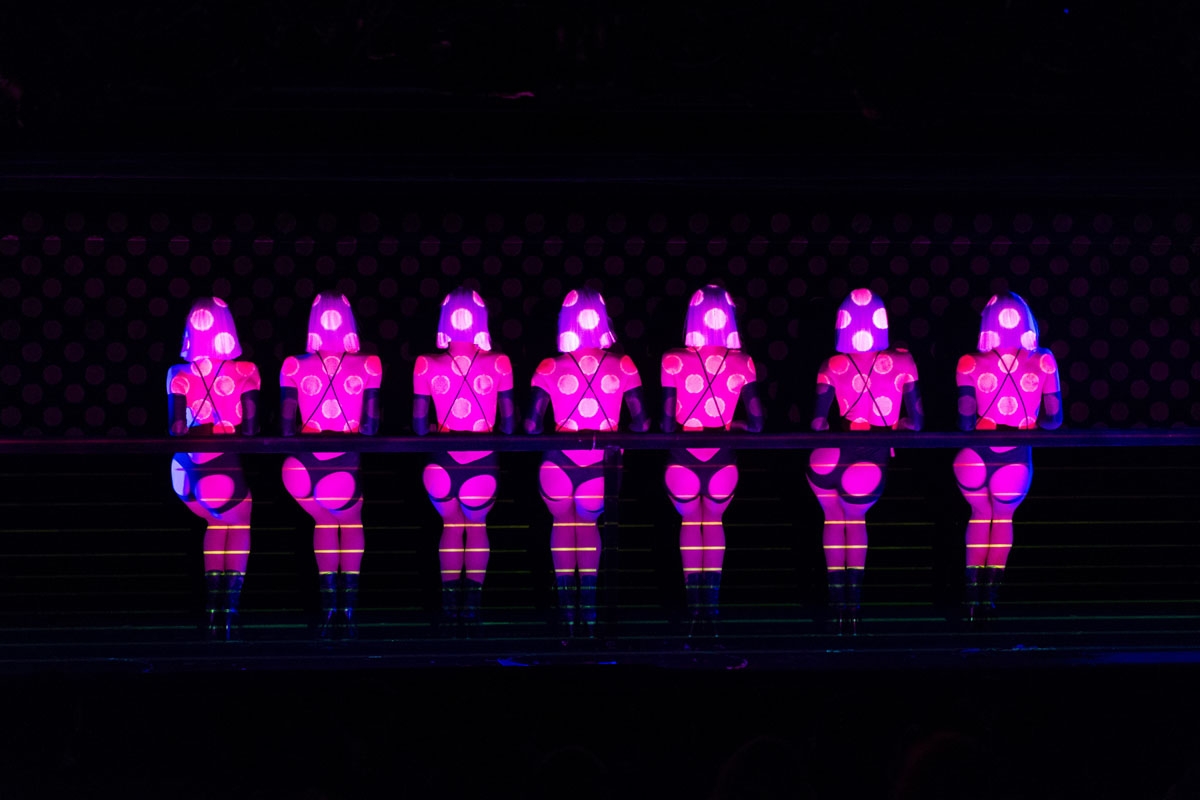 Dancers perform Baby buns on the stage of the Parisian cabaret Crazy Horse on September 14, 2017 in Paris.