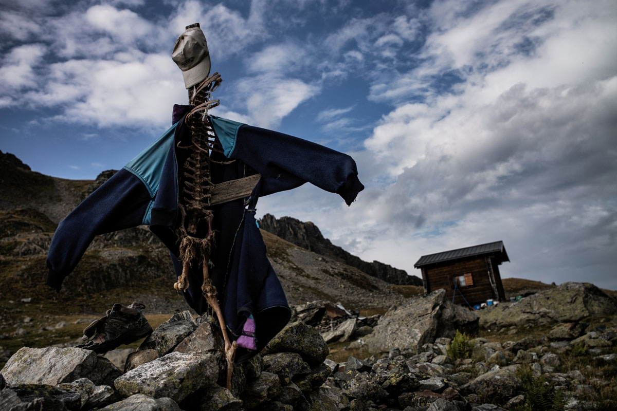 A sculpture made with sheep bones and old clothes by French shepherd Gaetan Meme, 24-years-old, is pictured near his altitude hut on August 21, 2018, along the Alpine pastures in the mountains near the Col du Glandon, in the French Alps. - Gaetan shepherd