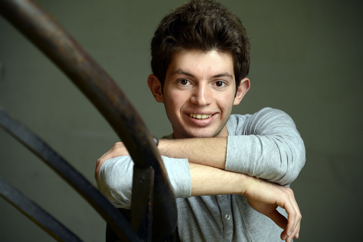 Syrian refugee Haytham Al Aswad, poses for a photograph at the French high-school where he will take his high-school diploma (baccalaureat) on June 9, 2015, in Paris Syrian refugee Haytham Al Aswad, poses for a photograph at the French high-school where he will take his high-school diploma (baccalaureat) on June 9, 2015, in Paris