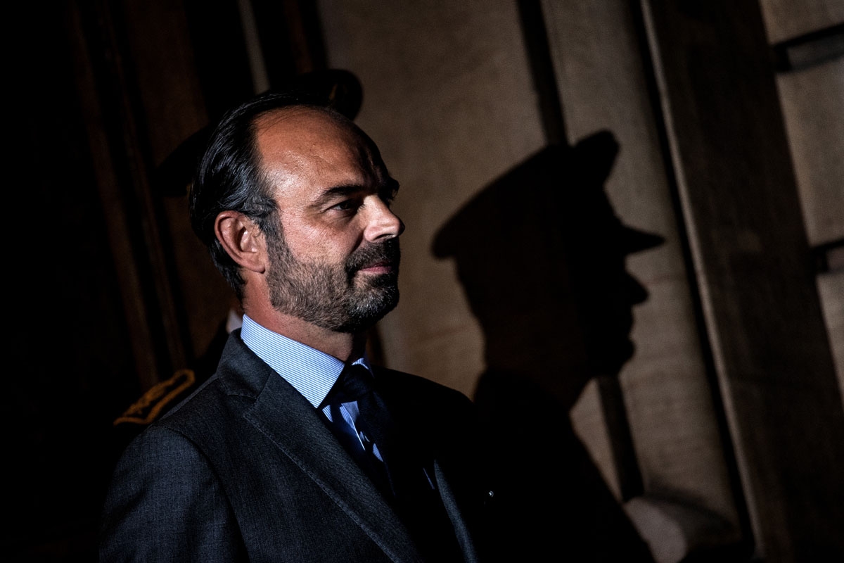 French prime minister and interim interior minister Edouard Philippe (L) waits for G6 ministers arrival on October 8, 2018 in Lyon, during the G6 Summit of Interior Ministers of France, Germany, United Kingdom, Spain, Italy and Poland. - Interior minister