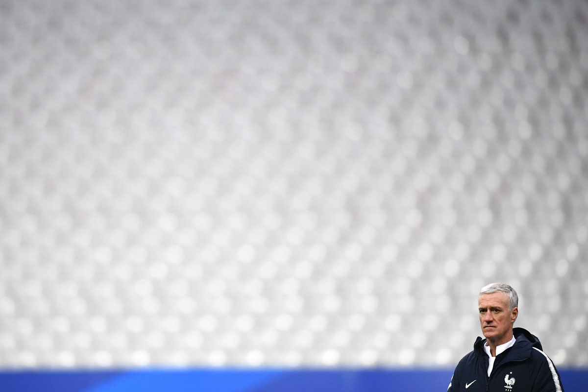 France's head coach Didier Deschamps looks on during a training session at the Stade de France in Saint-Denis, northern Paris, on March 22, 2018 on the eve of the international friendly football match against Colombia.