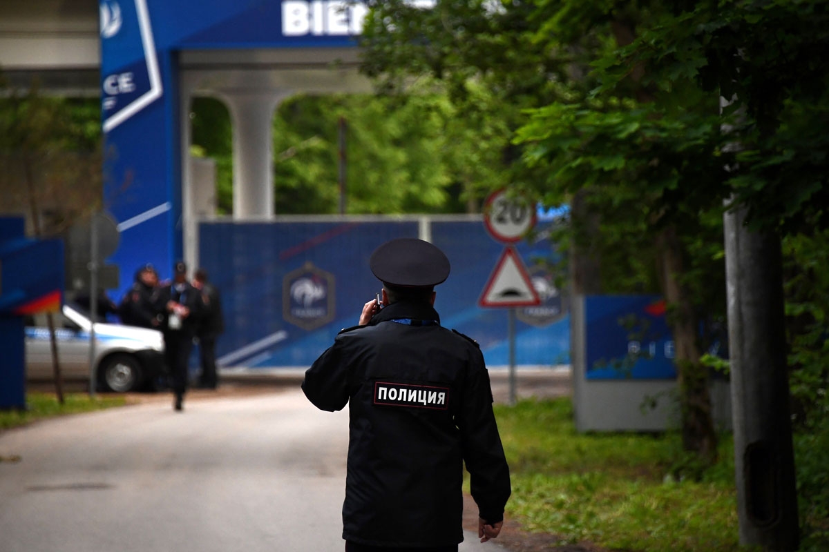 A policeman stands guard at the entrance of the hotel of France's national football team prior to the arrival of players, on June 10, 2018, in the village of Kostrovo, near the town of Istra, some 70 km west of Moscow, ahead of the Russia 2018 World Cup.