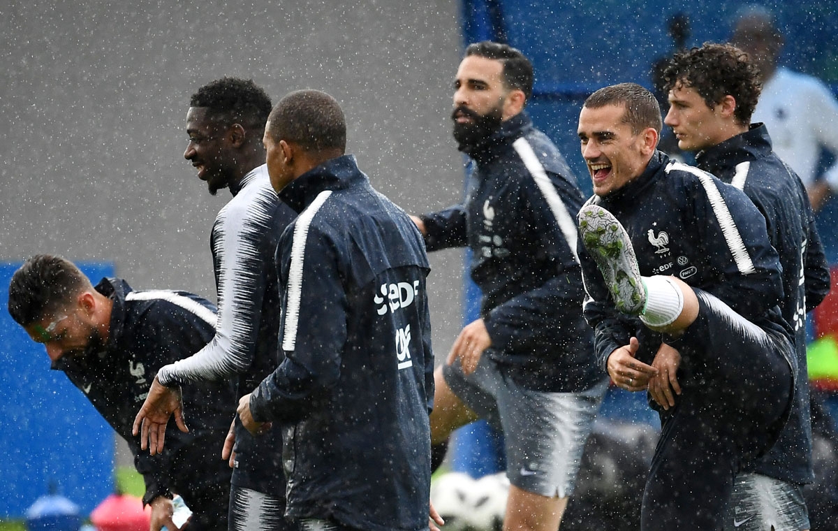 France's forward Antoine Griezmann (2nd R) smiles during a training session at the Glebovets stadium in Istra, some 70 km west of Moscow, on June 11, 2018, ahead of the Russia 2018 World Cup football tournament.