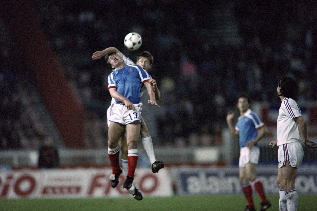 This file picture dated 29 April 1989 shows France's Didier Deschamps (front), during his first match with the French national team, fighting for a header against an unidentified player of Yugoslavia, in Paris. Deschamps is set to become the first Fren