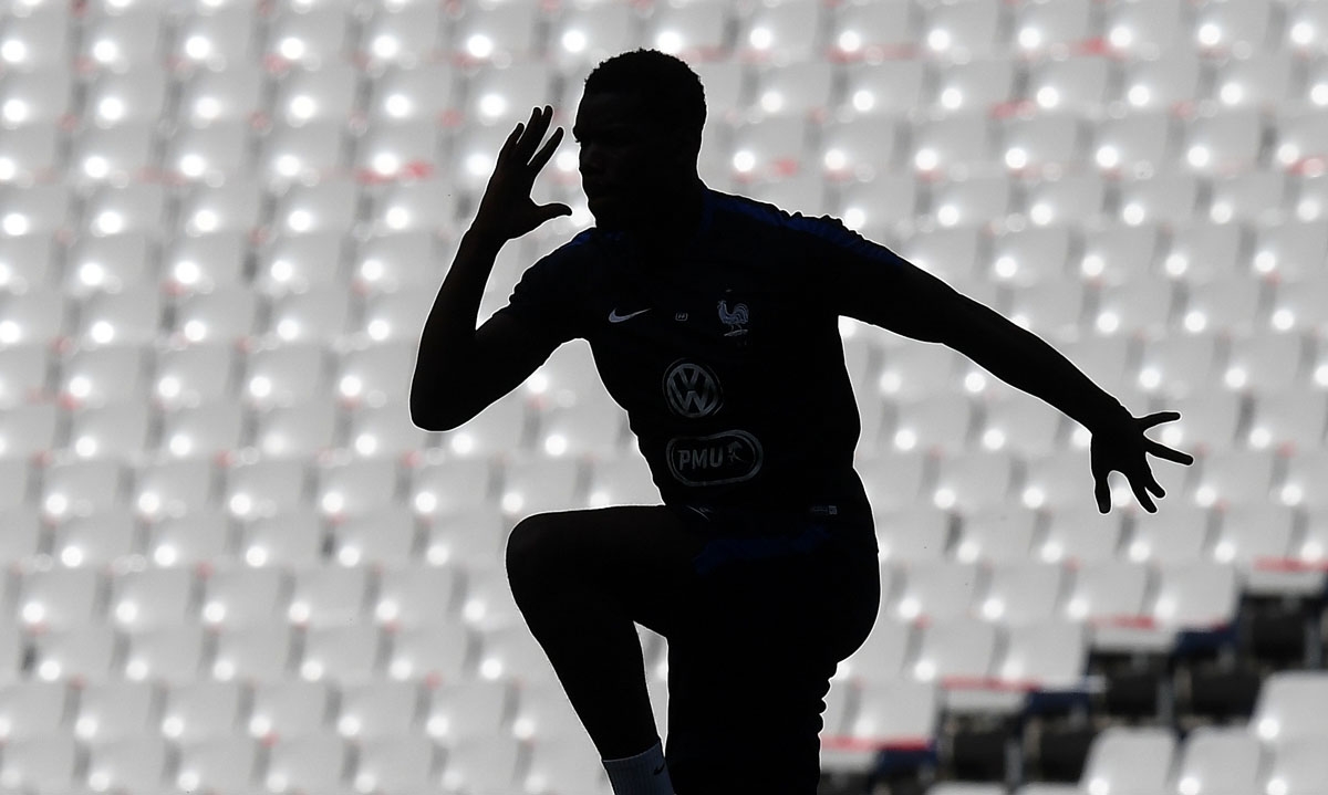 France's midfielder Paul Pogba jumps during a training session at the Stade de France stadium in Saint-Denis, north of Paris, on June 12, 2017 on the eve of the friendly football match against England. / AFP PHOTO / FRANCK FIFE