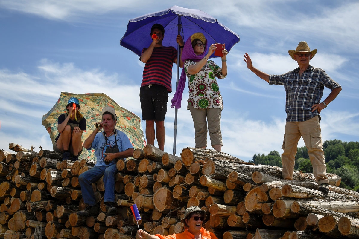 Supporters cheer along the road during the 160,5 km fifth stage of the 104th edition of the Tour de France cycling race on July 5, 2017 between Vittel and La Planche des Belles Filles