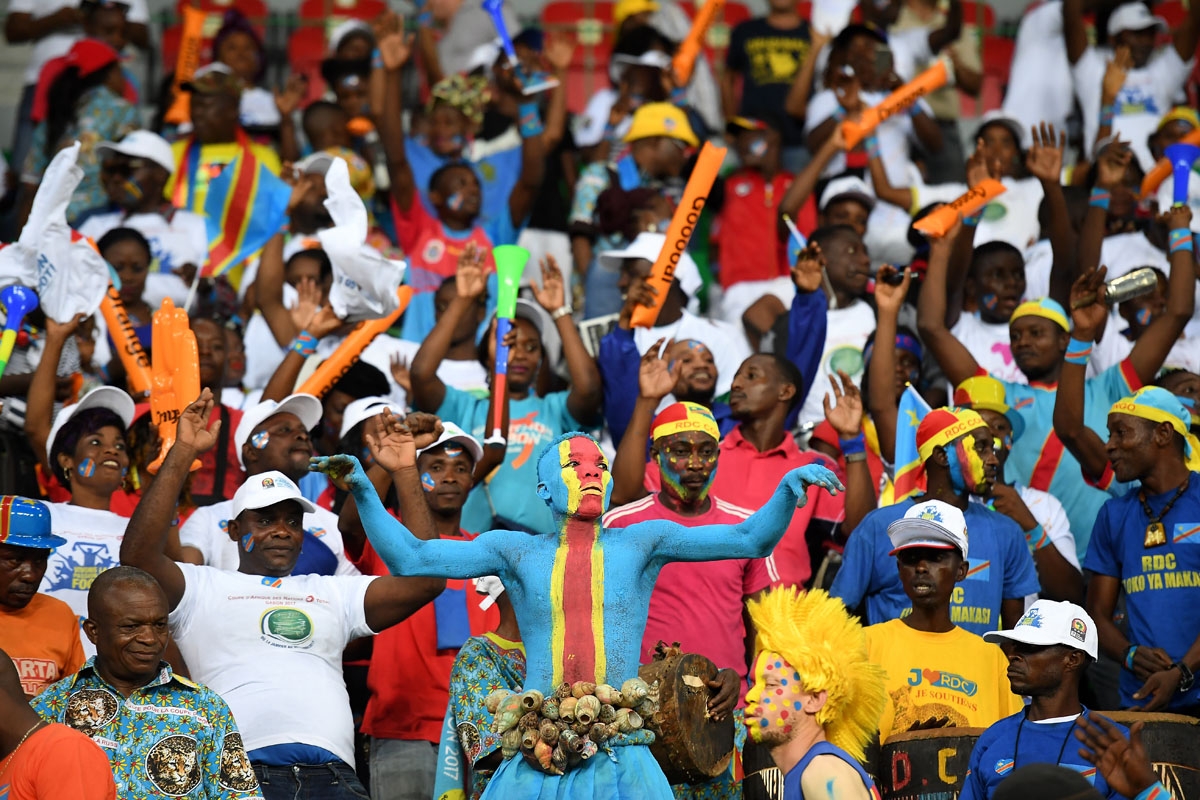 A Democratic Republic of the Congo supporter cheers during the 2017 Africa Cup of Nations group C football match between Togo and DR Congo in Port-Gentil on January 24, 2017.