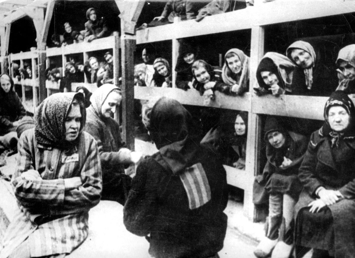 Women are pictured in their barrack after the liberation in January 1945 of the Oswiecim (Auschwitz) concentration camp