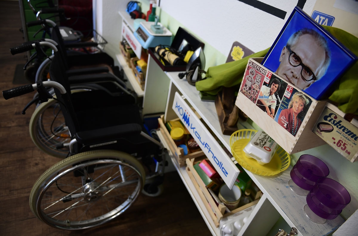 Wheel chairs are parked inside an east German 60s styled lounge at a nursing home in Dresden, eastern Germany, on June 14, 2017.