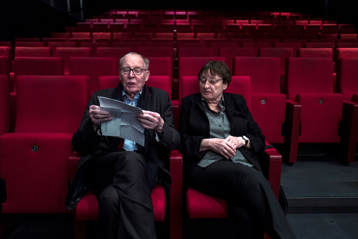 German married couple Erika and Ulrich Gregor pose at a movie theatre in Berlin on February 8, 2018. It's a love that was born in a cinema in 1950s Cold War Berlin and that's been nourished for over six decades by at least a movie a day together. It's tha