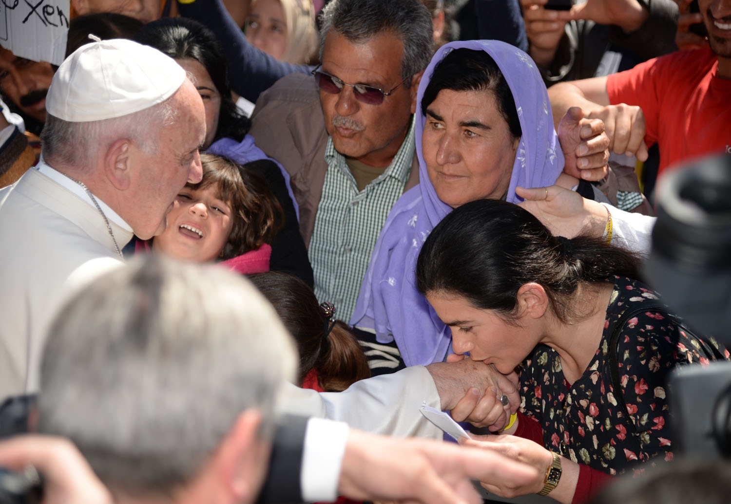 Pope Francis meets refugees at he Moria refugee camp on April 16, 2016 near the port of Mytilene, on the Greek island of Lesbos