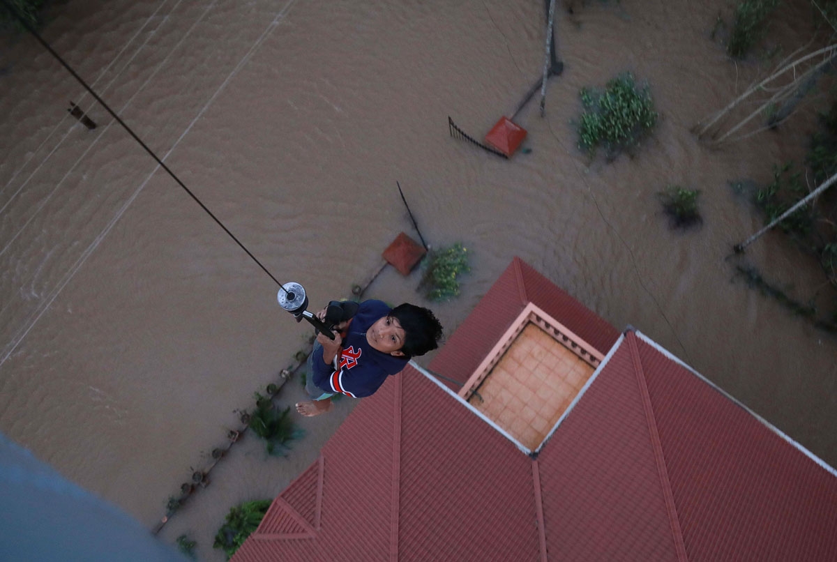 A person is airlifted near Kochi, Kerala, August 18, 2018.