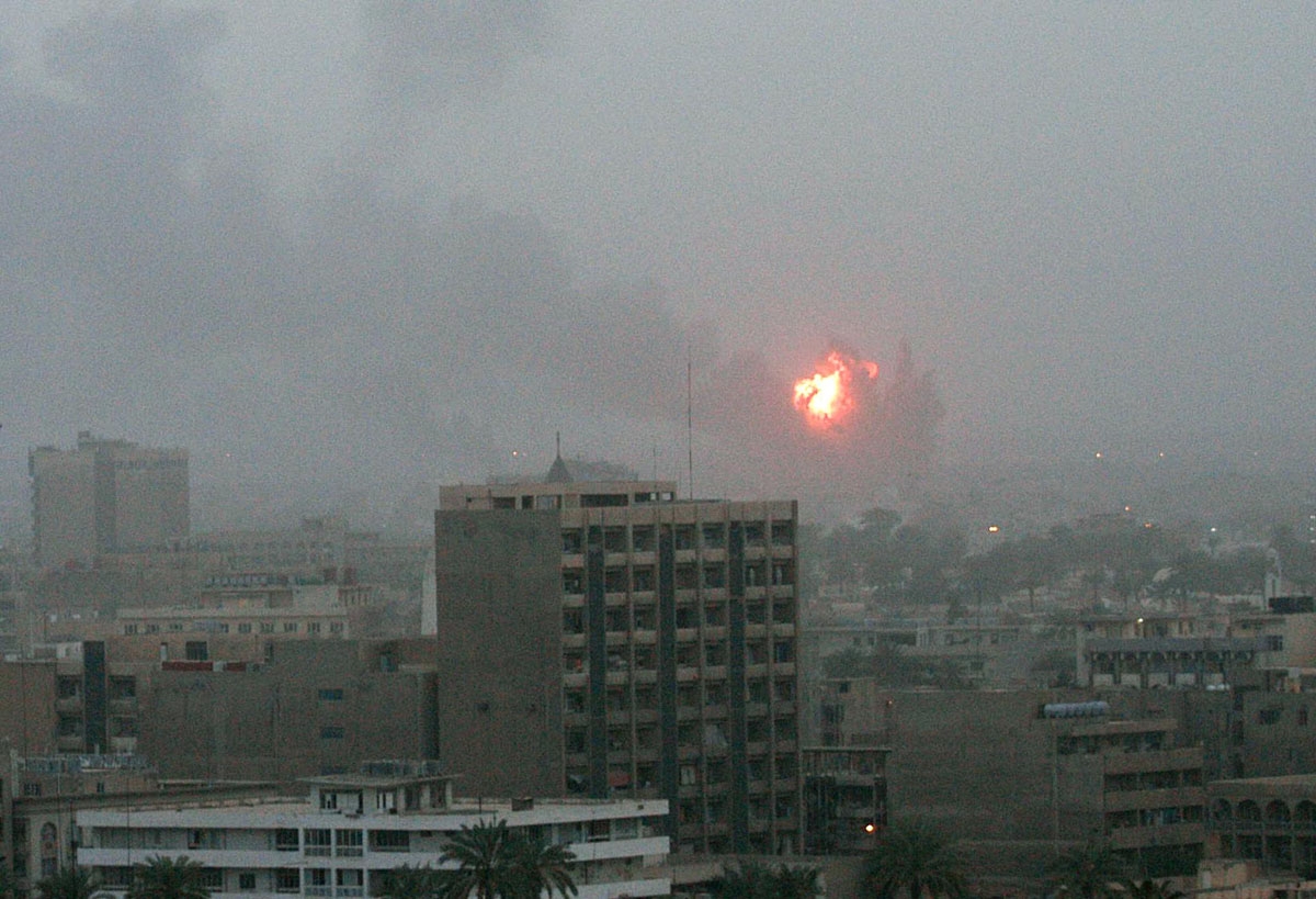An explosion is seen in Baghdad 20 March, 2003, as the US launched a war on Iraq with air strikes on the capital, making good on threats of military action to push President Saddam Hussein out of power. US President George W. Bush announced 19 March he ha