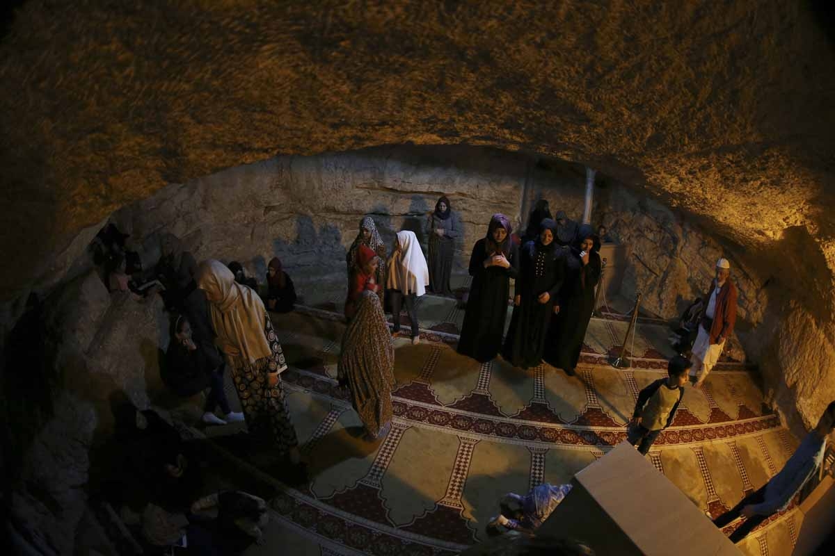 Women pray in the shrine under the Dome of the Rock at the Al-Aqsa compound in Jerusalem's Old City, April, 2017.