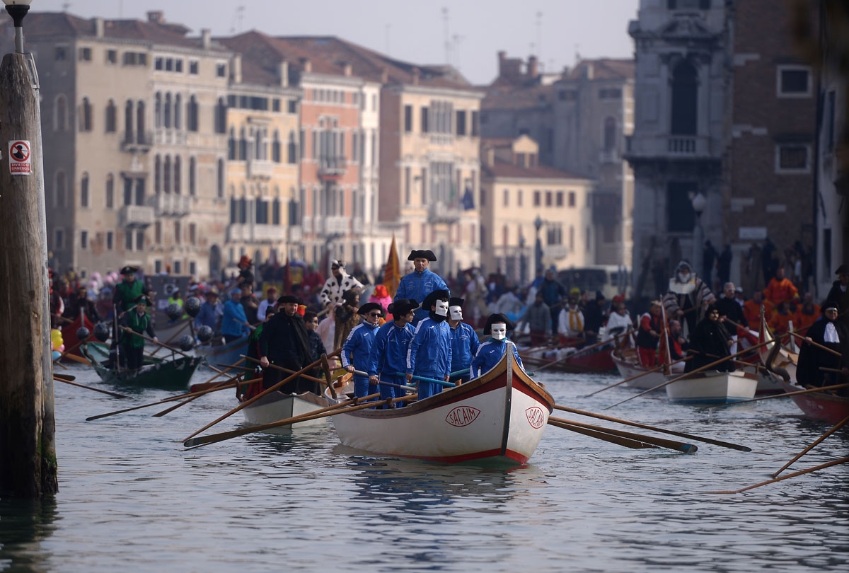 A general view shows boats on the Grand Canal during the opening regatta of the Venice Carnival on January 28, 2018