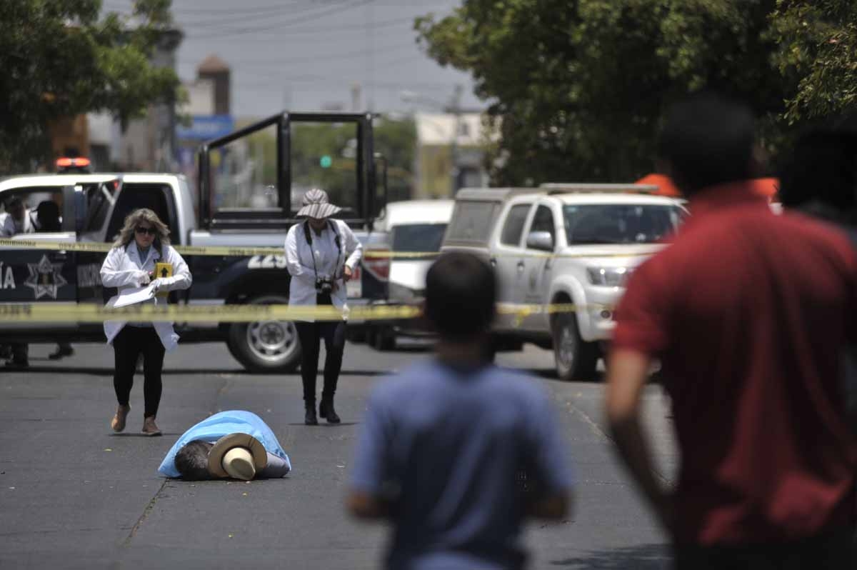 The body of Mexican journalist Javier Valdez lies on the street after he was shot dead in Culiacan, Sinaloa, Mexico, on May 15, 2017.