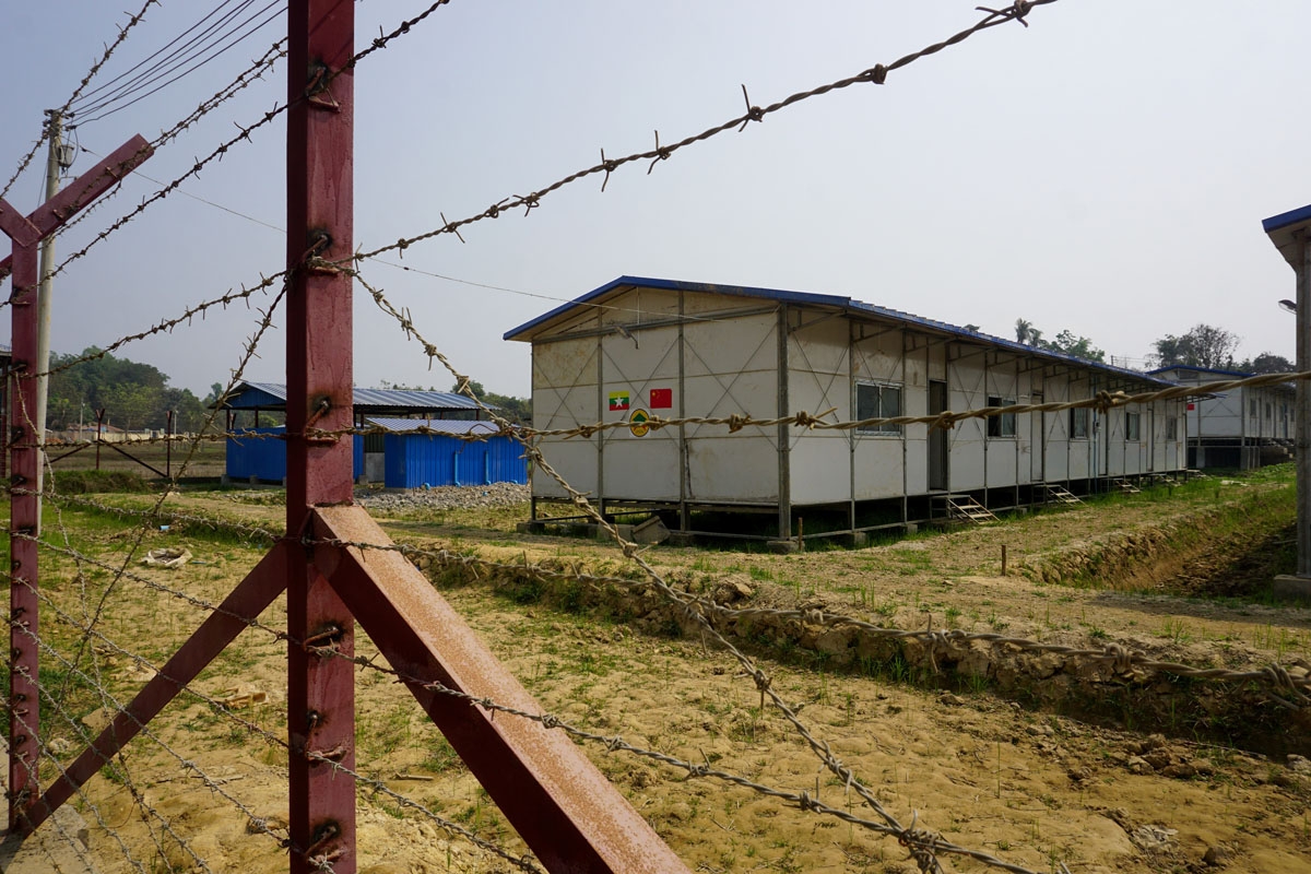 In this photograph taken on March 18, 2018, government's newly built processing camp for minority Rohingya Muslims pasted with Myanmar and Chinese flag stickers is seen in Taung Pyo Letwe located in Maungdaw in Rakhine state near Bangladesh border as Myan