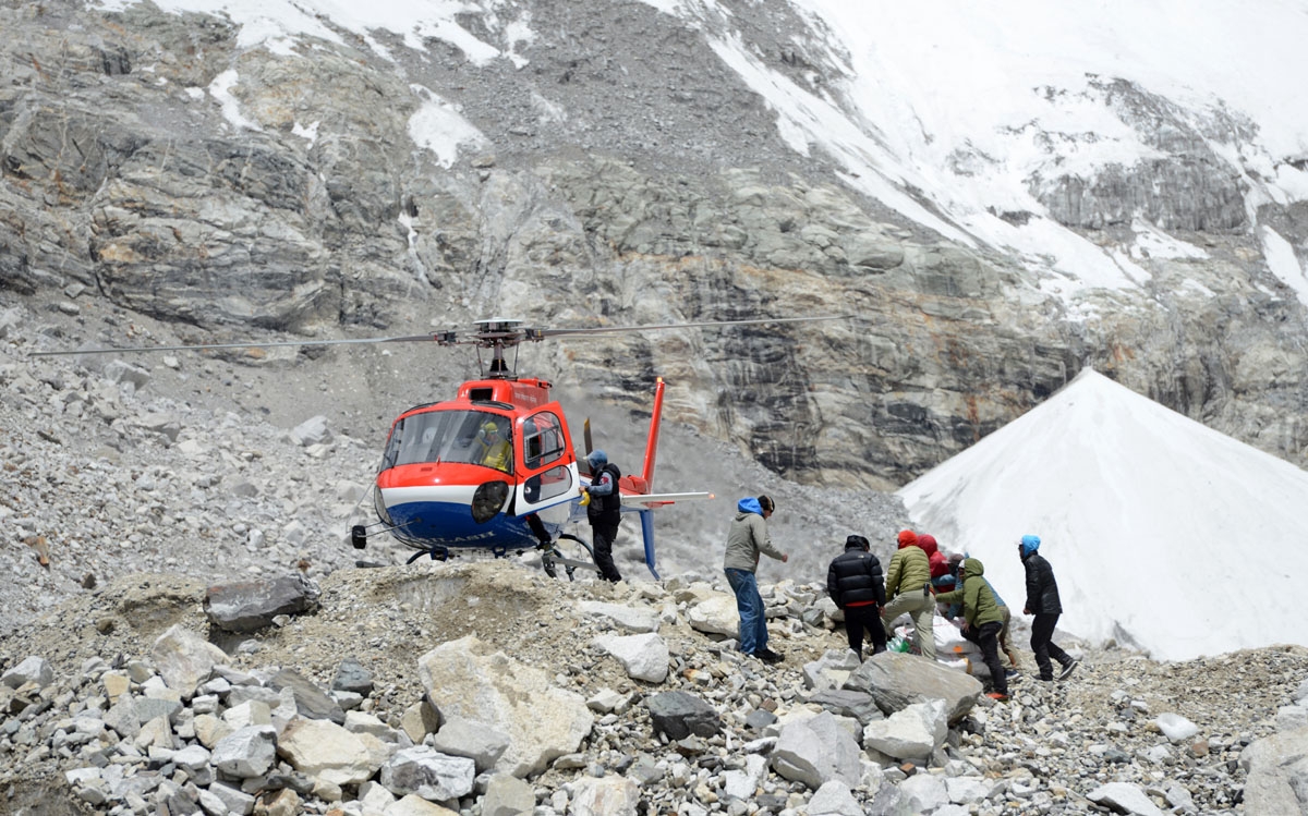 A helicopter delivers goods to Everest base camp, April 24, 2018.