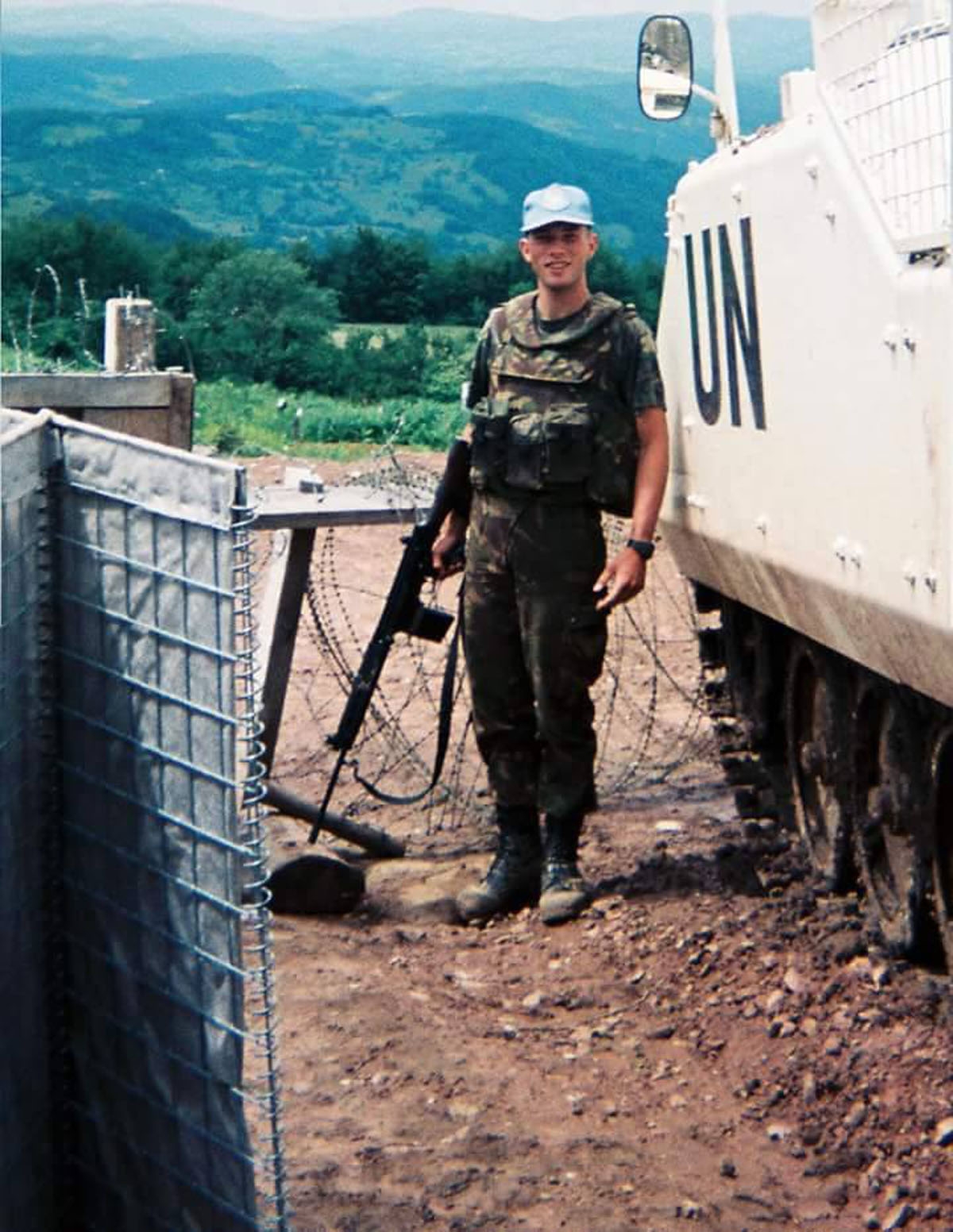 This handout picture taken on April 1995 and released in July 9, 2015 shows peacekeeper Edo van den Berg from Netherlands posing at the Charlie chekpoint in Srebrenica.