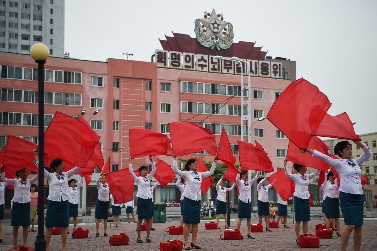 Members of a local propaganda troupe perform in a public square as part of a 200 day campaign aimed at kickstarting a new economic plan, in Pyongyang on July 10, 2016