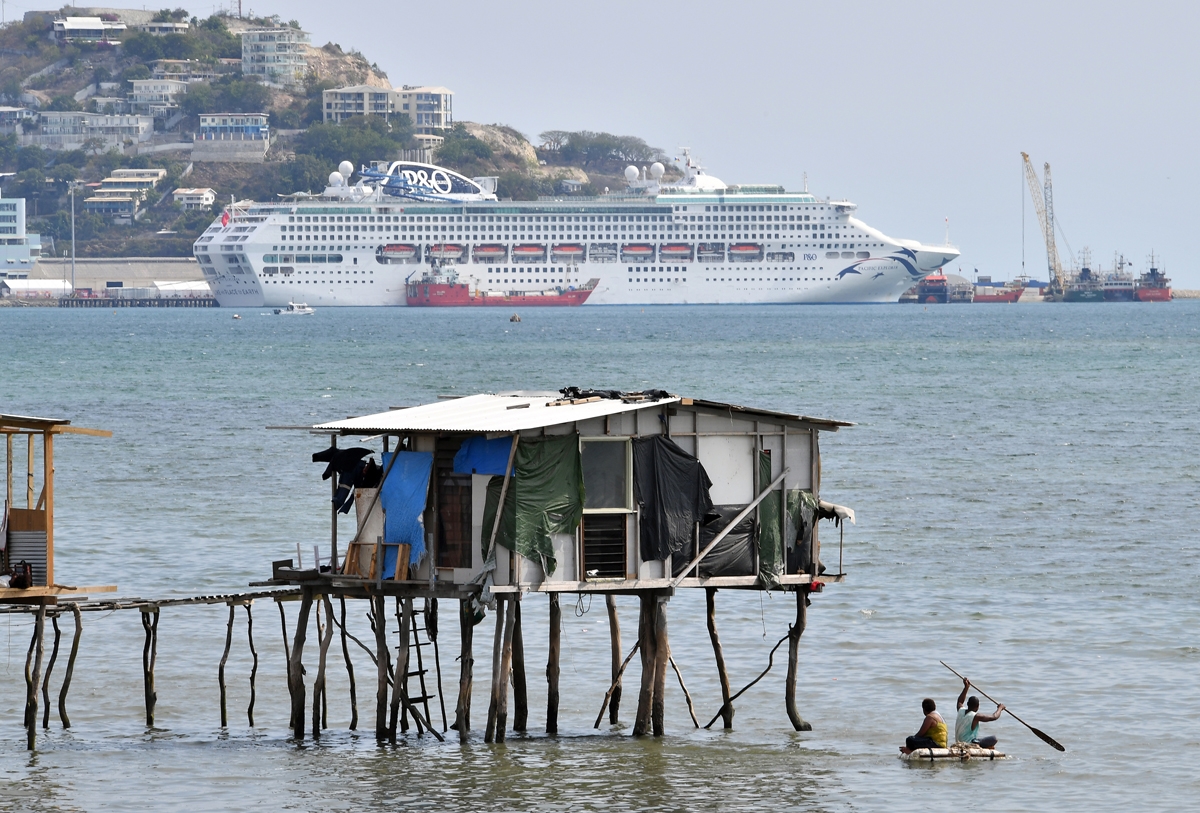 This picture taken on November 19, 2018 show makeshift huts seen across the ship accommodating delegates and journalists attending the Asia-Pacific Economic Cooperation (APEC) Summit in Port Moresby.