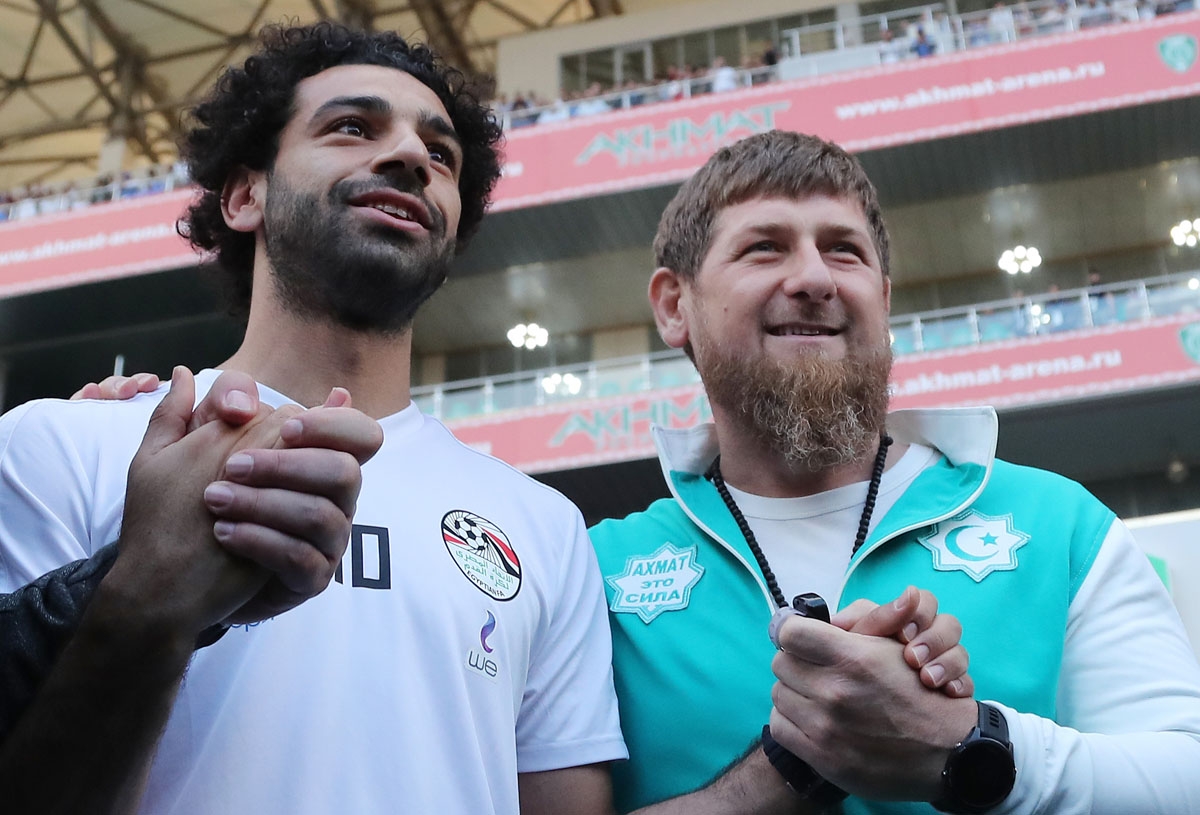 Egyptian national football team player and Liverpool's star striker Mohamed Salah (L) poses with head of the Chechen Republic Ramzan Kadyrov during a training at the Akhmat Arena stadium in Grozny on June 10, 2018, ahead of the Russia 2018 World Cup.