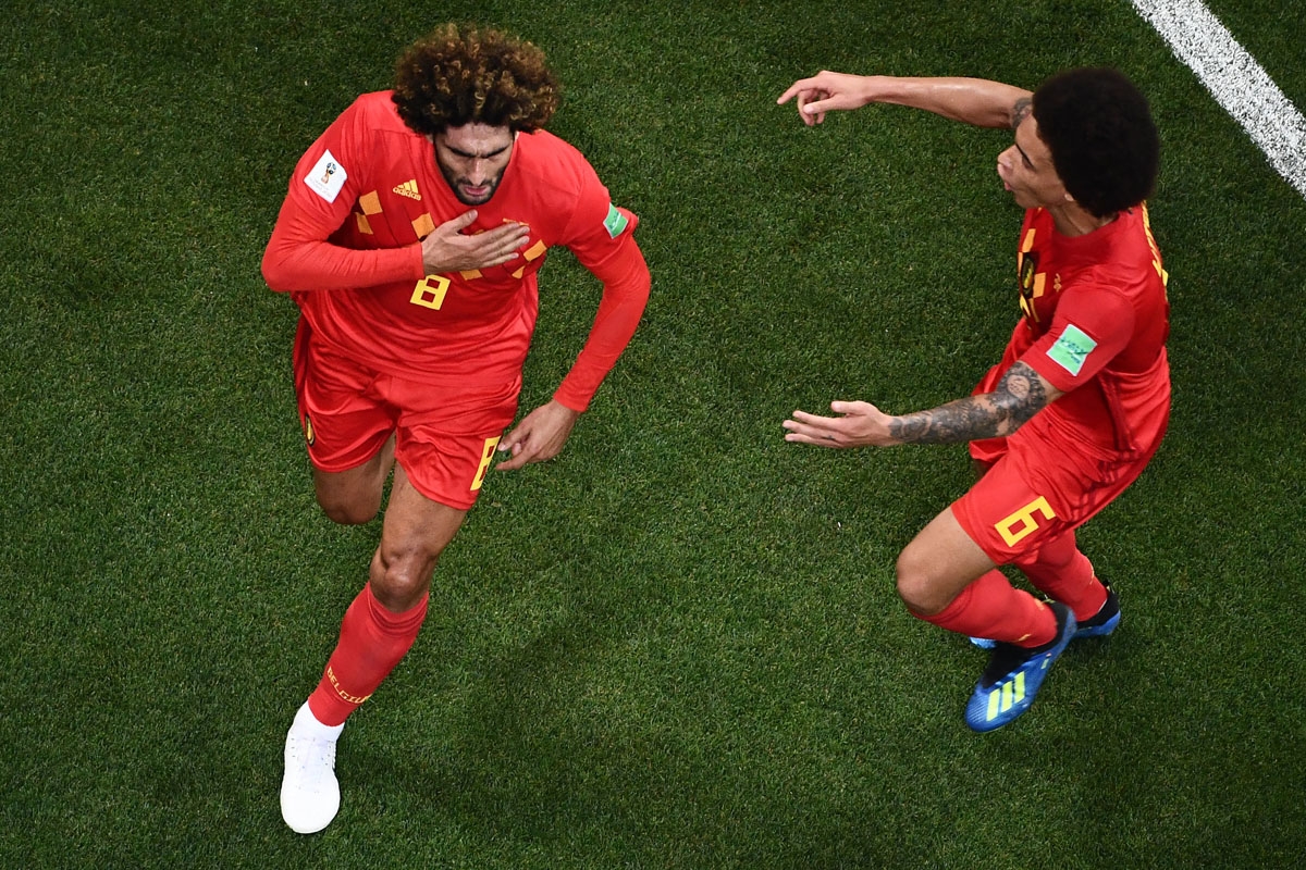 Belgium's midfielder Marouane Fellaini (L) celebrates with Belgium's midfielder Axel Witsel after scoring his team's second goal during the Russia 2018 World Cup round of 16 football match between Belgium and Japan at the Rostov Arena in Rostov-On-Don on