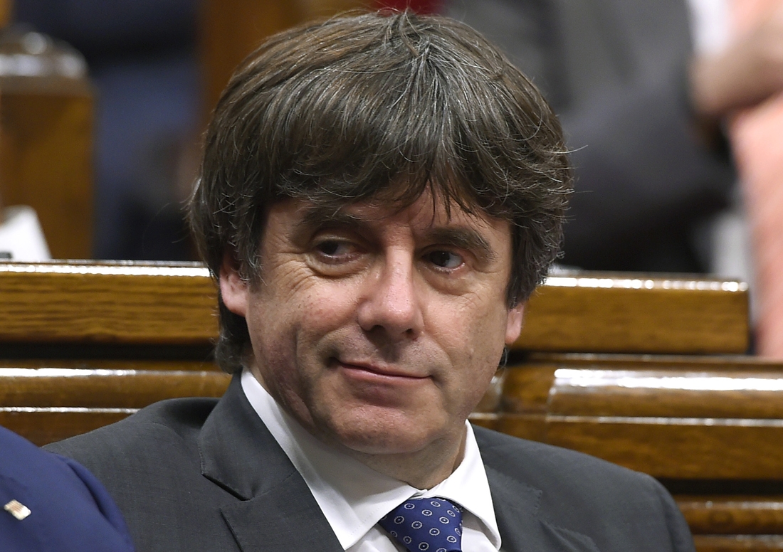 Catalan president Carles Puigdemont attends a session of the Catalan parliament in Barcelona on October 27, 2017.