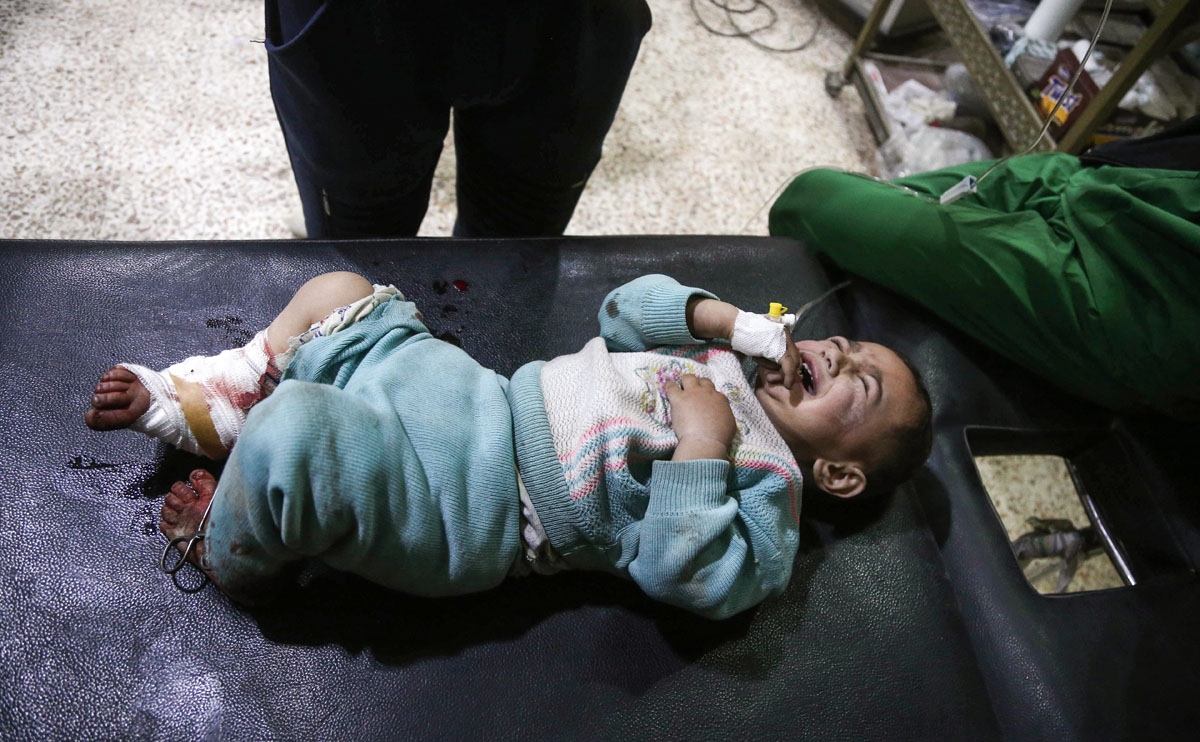 The little boy who was injured in shelling that killed his mother in the neighbourhood of Ain Terma, March 22, 2018.