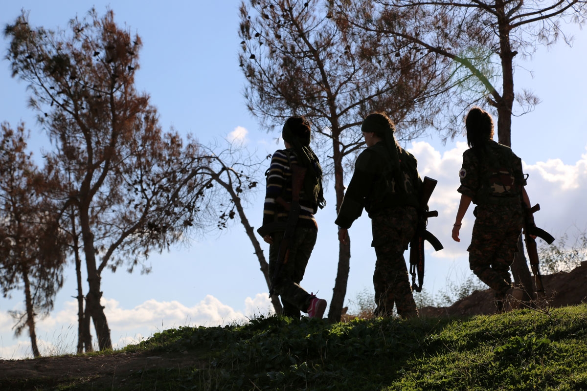Syriac Christian women, members of the battalion called the Female Protection Forces of the Land Between the Two Rivers fighting the Islamic State group, take part in a training on December 1, 2015 at their camp in the town of al-Qahtaniyah, near the Syri