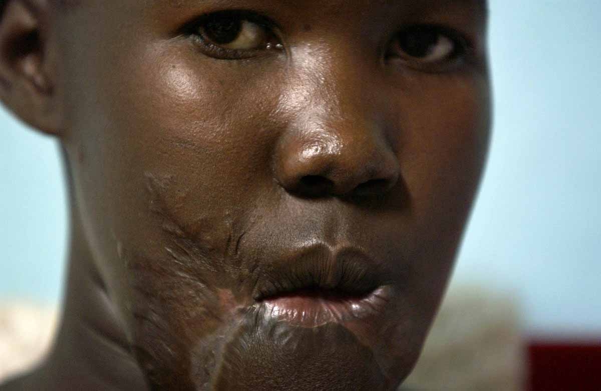 Nancy, 16, who was the baby sitter of Lord Resistance Army (LRA) leader Joseph Kony, poses 05 February 2006 at the Santa Monica Tayloring Centre for girls in Gulu, nort