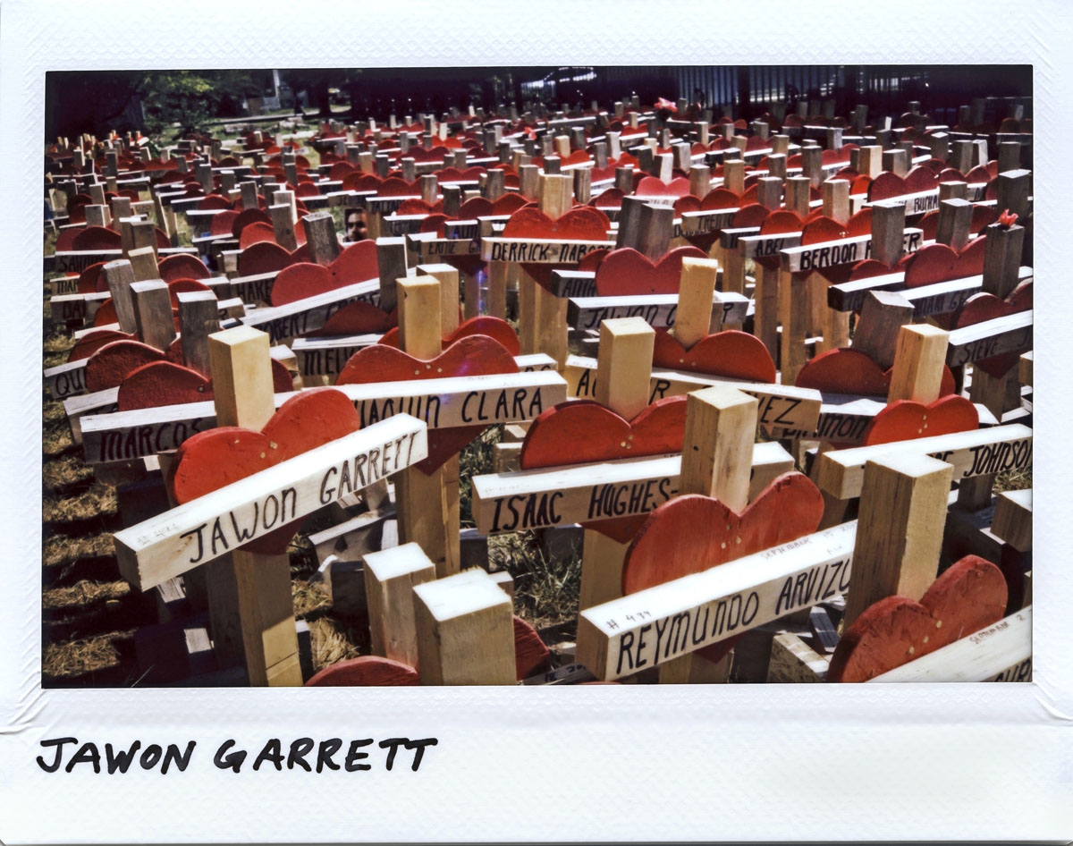 A cross for Jawon Garrett sits among dozens of other crosses at a make-shift memorial for the victims of violence in the 5500 block of South Bishop Street in Chicago, Illinois on September 25, 2017. Garrett, 40-year-old, died from multiple gunshots to th