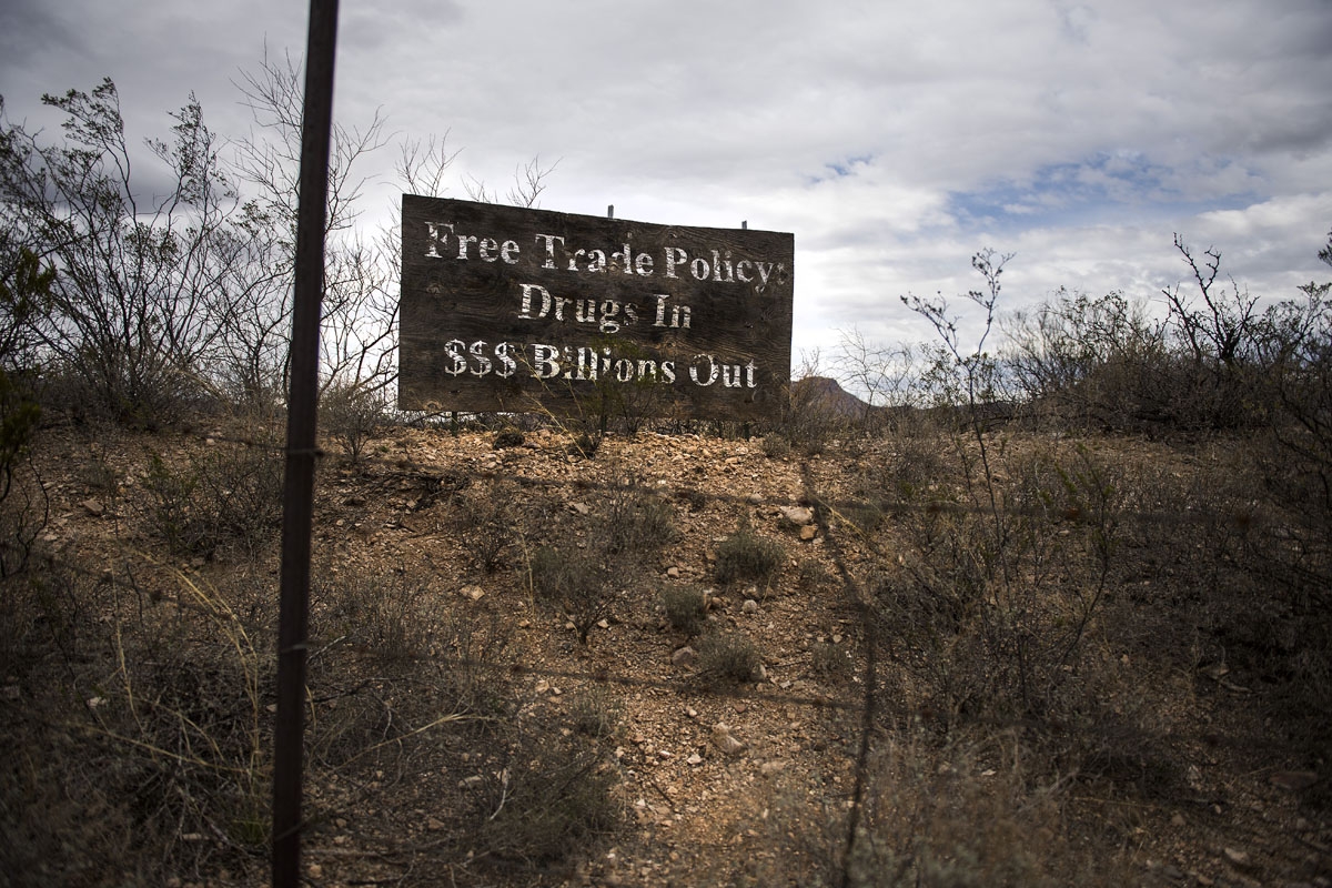 An old sign stands out on the town limits in Douglas, Arizona, February 18, 2017 on the US/Mexico border.