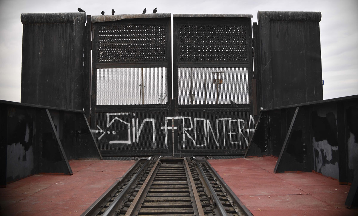 Train rails from the Mexiccan border of Ciudad Juarez to US city of El Paso Texas closed panel and sign reading ''Sin Frontera'' is seen on February 18, 2017.