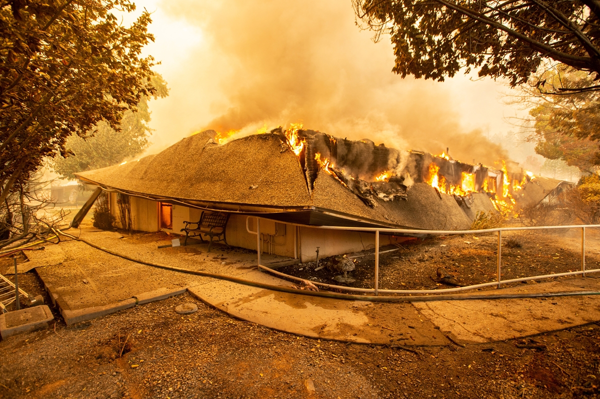 The Feather River Hospital burns down during the Camp fire in Paradise, California on November 8, 2018.