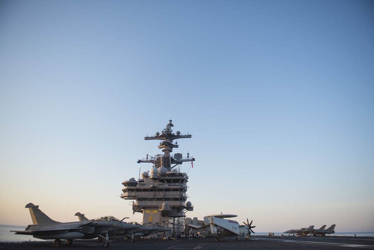 French aircraft are seen early morning on the deck of the the USS George H.W. Bush aircraft carrier on May 12, 2018 in the Atlantic Ocean.