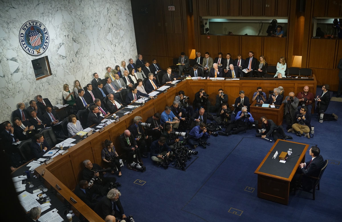 Ousted FBI director James Comey listens during a hearing before the Senate Select Committee on Intelligence on Capitol Hill June 8, 2017 in Washington, DC. /