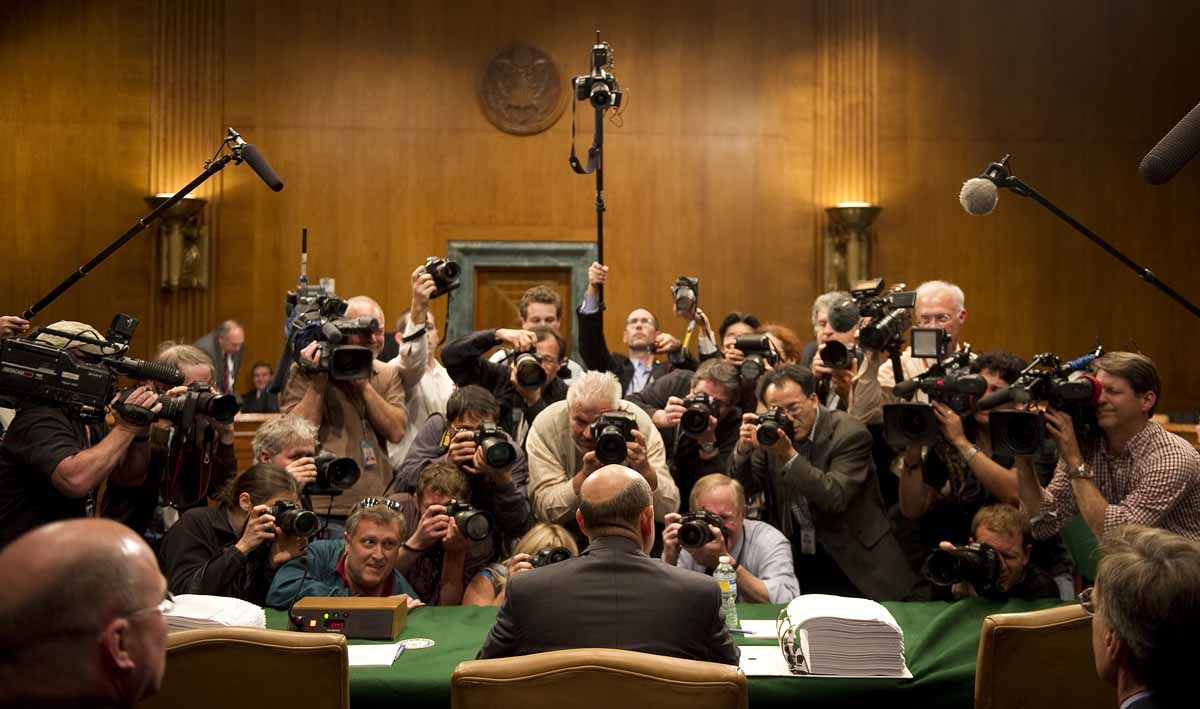 Try getting an original photo from there. Photographers jostle for position in a tiny space as Goldman Sachs CEO Lloyd Blankfein (C) arrives to testify before a Senate investigative committee on Capitol Hill in Washington, DC, April 27, 2010.