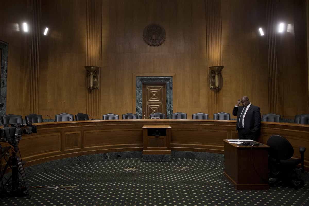 Empty seats in the Senate Finance Committee hearing room on Capitol Hill in Washington, DC, January 31, 2017, after Senate democrats boycotted the markup hearings for the nominations of Steven T. Mnuchin, of California, to be Secretary of the Treasury,