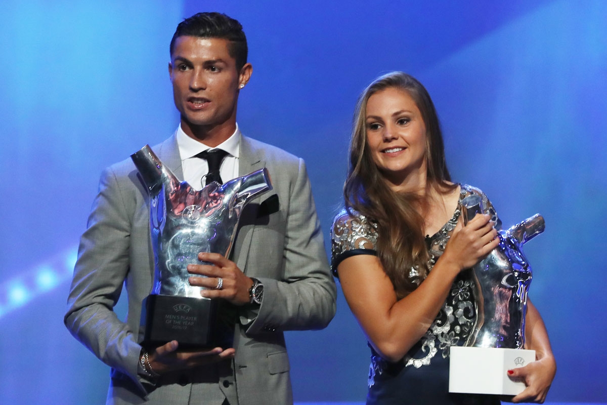 Real Madrid's Portuguese forward Cristiano Ronaldo (L) and Netherlands' midfielder Lieke Martens pose after he was awarded the title of UEFA 2016/17 Best football Player and she was awarded UEFA 2016/17 Best Women's football Player at the conclusion of th Real Madrid's Portuguese forward Cristiano Ronaldo (L) and Netherlands' midfielder Lieke Martens pose after he was awarded the title of UEFA 2016/17 Best football Player and she was awarded UEFA 2016/17 Best Women's football Player at the conclusion of th