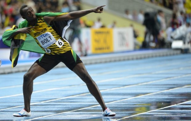 Usain Bolt célèbre sa victoire sur le 100 m aux Mondiaux d'athlétisme de Moscou (photo : AFP / Olivier Morin) Usain Bolt célèbre sa victoire sur le 100 m aux Mondiaux d'athlétisme de Moscou (photo : AFP / Olivier Morin)