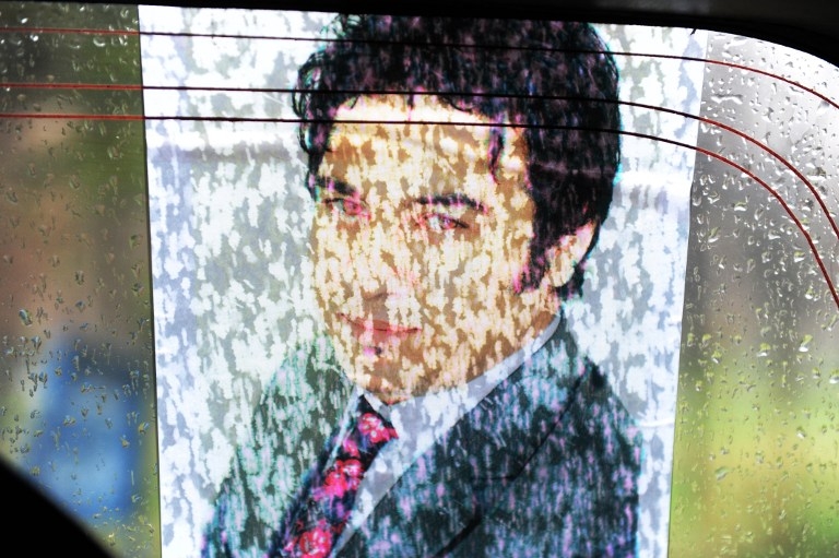 La pluie dissout un portrait de Sardar Ahmad lors de ses funérailles, le 23 mars à Kaboul La pluie dissout un portrait de Sardar Ahmad lors de ses funérailles, le 23 mars à Kaboul